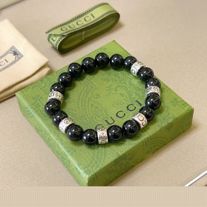 G*u*i bracelets